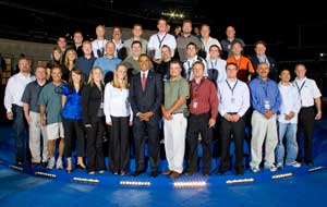 Barack Obama poses with the Invesco crew